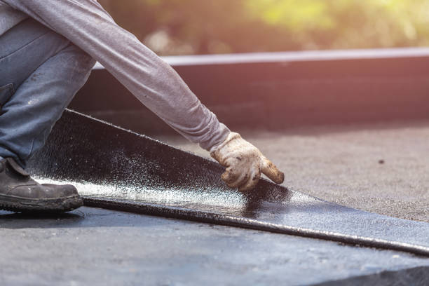 Professional Basement Waterproofing technician working in Stafford, VA